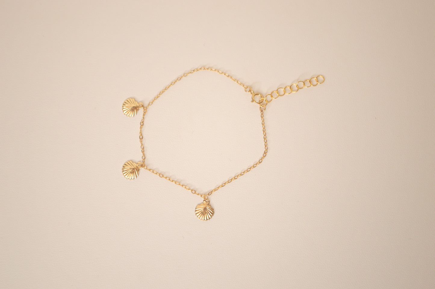 Clam charm bracelet