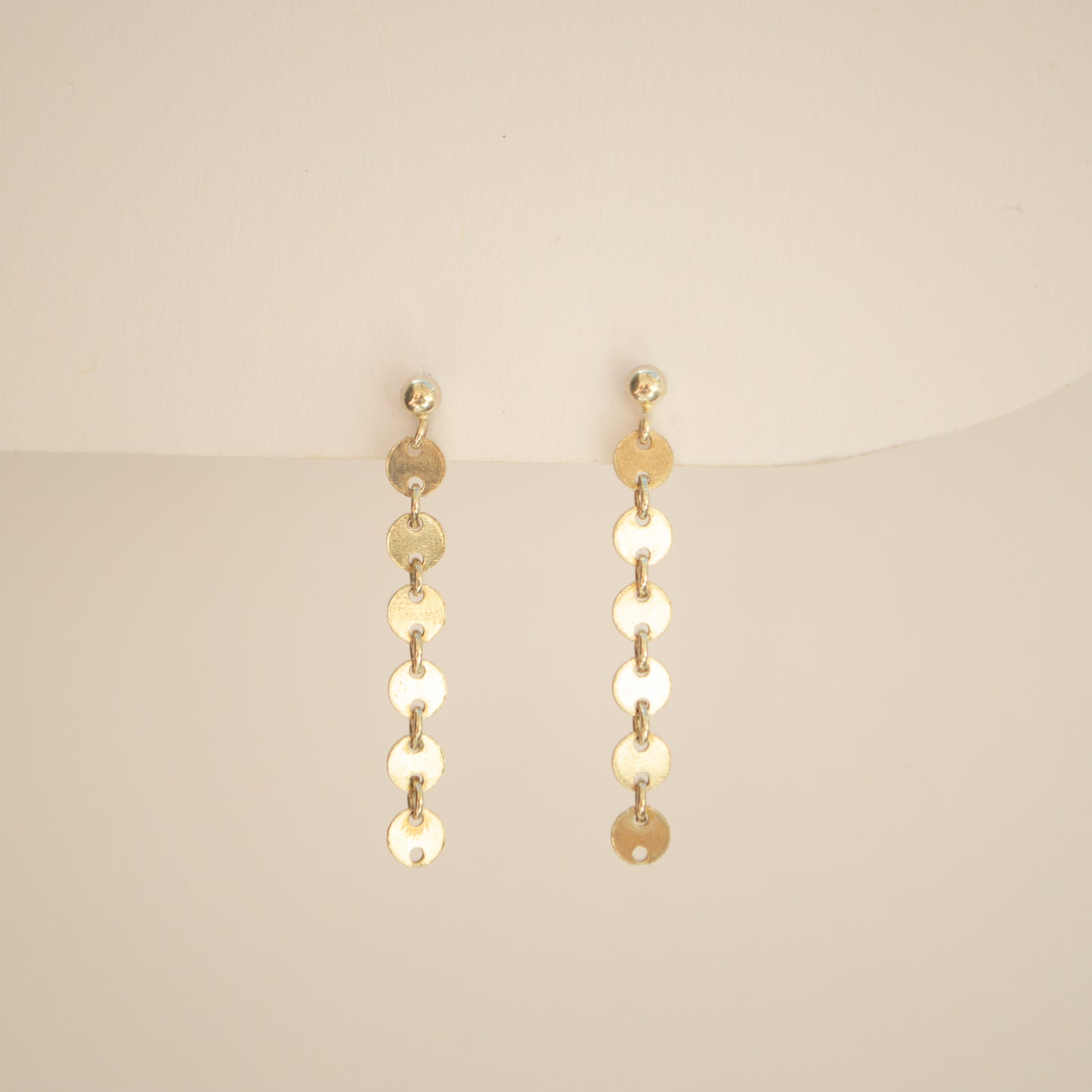 Silver disco dangle studs