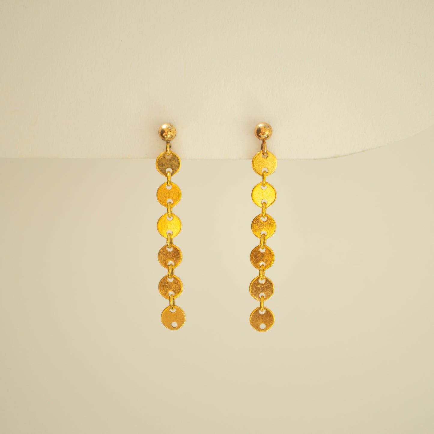 Gold disco dangle studs