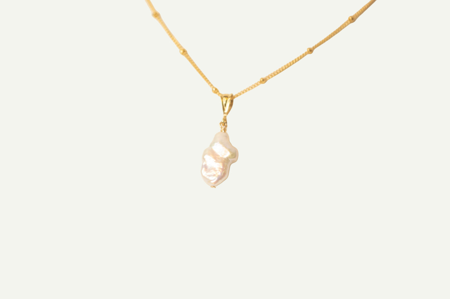 Celestial Pearl Cross Necklace