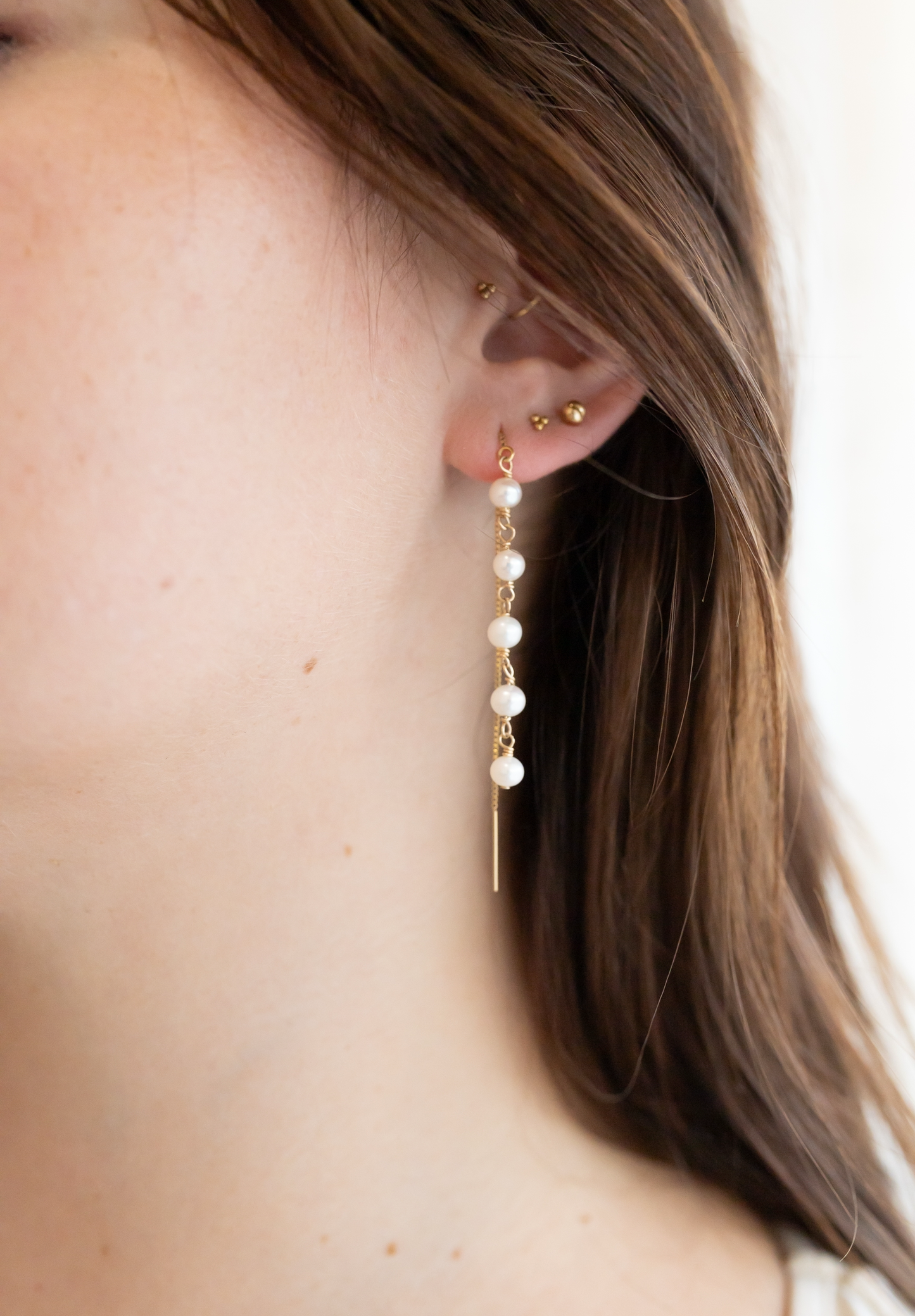 Tiered pearl threaders