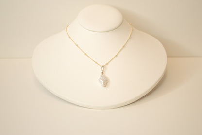 celestial pearl cross necklace