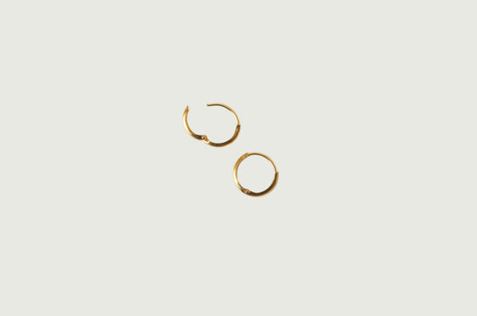 Click Huggie Earring in 14k gold filled by Syd Squared Jewelry