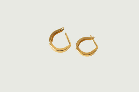 Staple Huggie Hoops in 14k gold filled by Syd Squared Jewelry