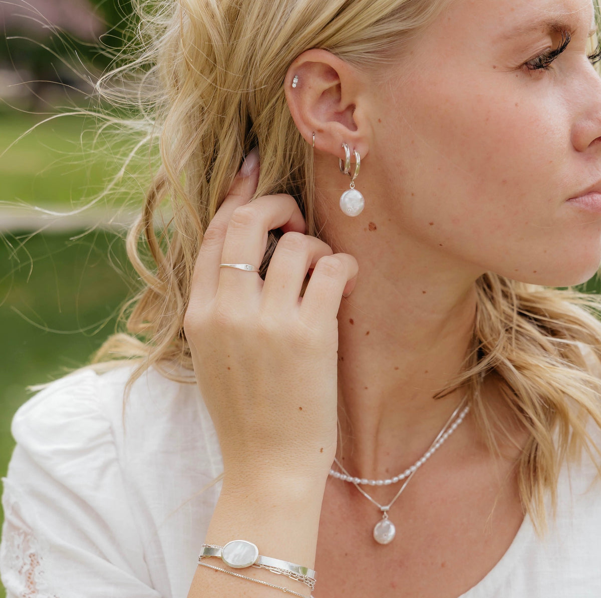 Étoile Pearl Earrings in 14k gold filled and .925 sterling silver by Syd Squared Jewelry