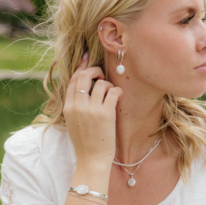 Étoile Pearl Earrings in 14k gold filled and .925 sterling silver by Syd Squared Jewelry