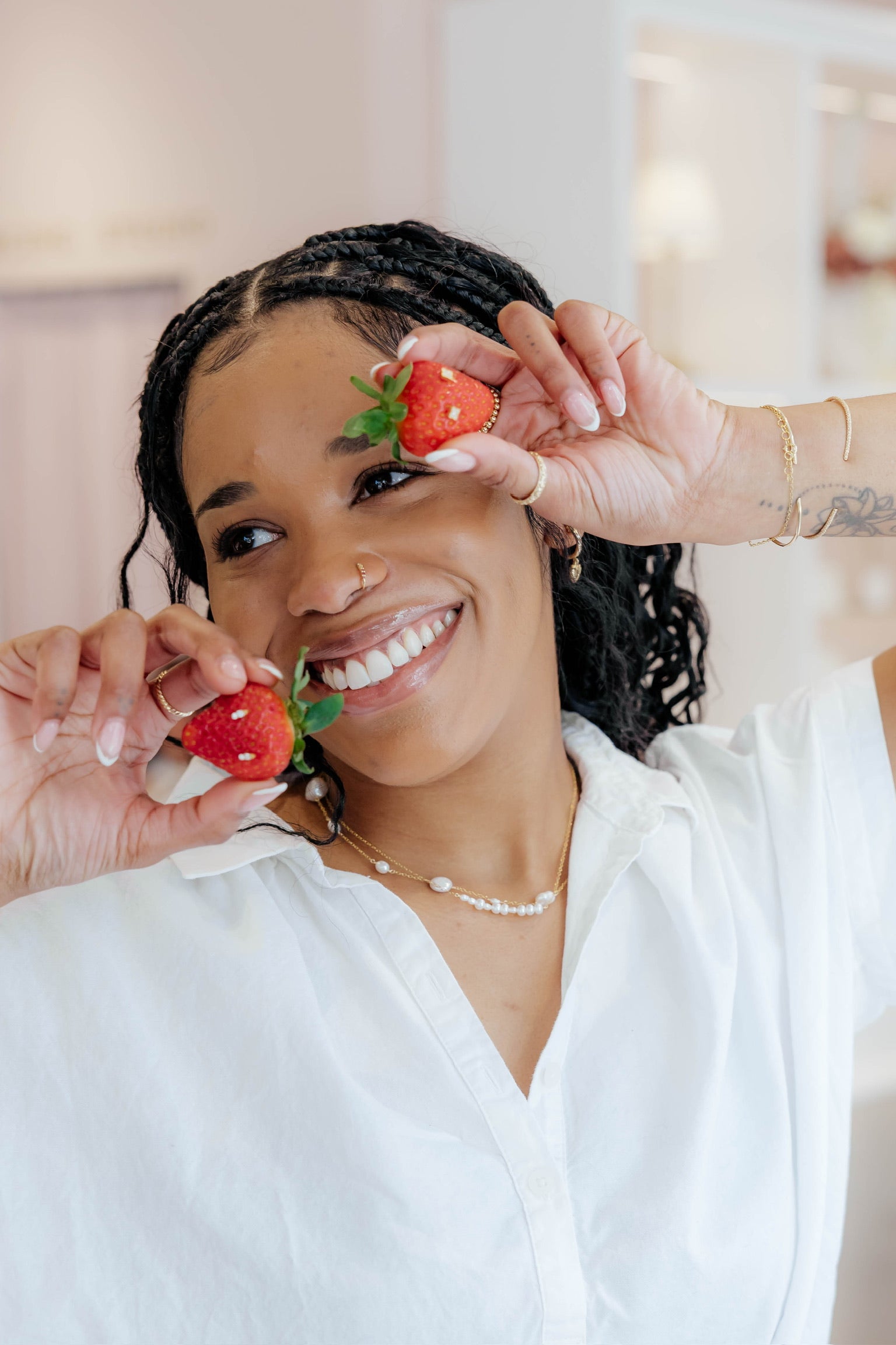 Woman with strawberries and jewelry 